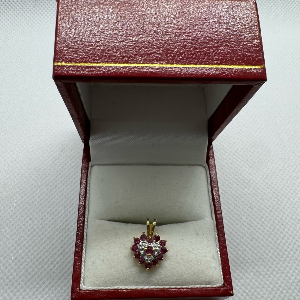 14 K genuine Ruby and diamond pendant